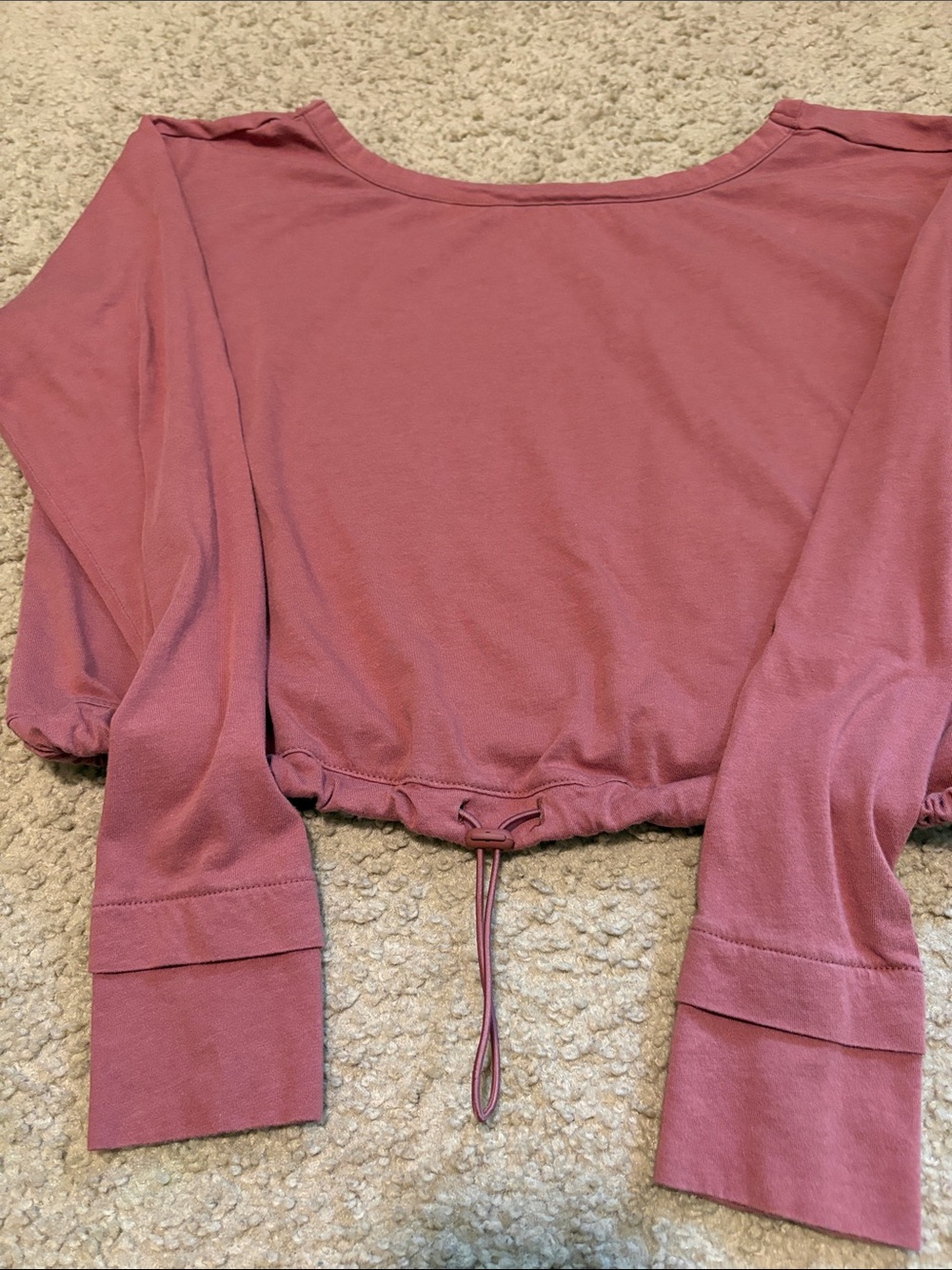 Long sleeve cropped top with pull tie waist